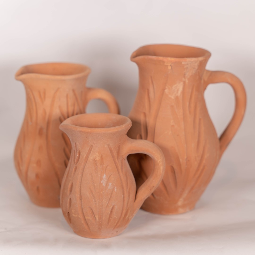 Pottery Pitcher Set